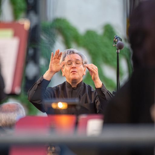 Emotional performer at Festival di Spoleto, expressing intense musical moment