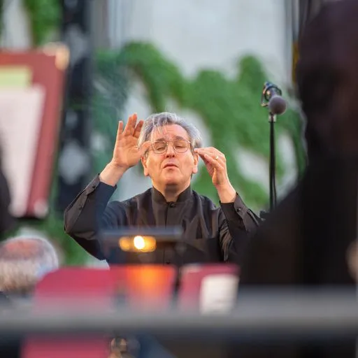 Emotional performer at Festival di Spoleto, expressing intense musical moment