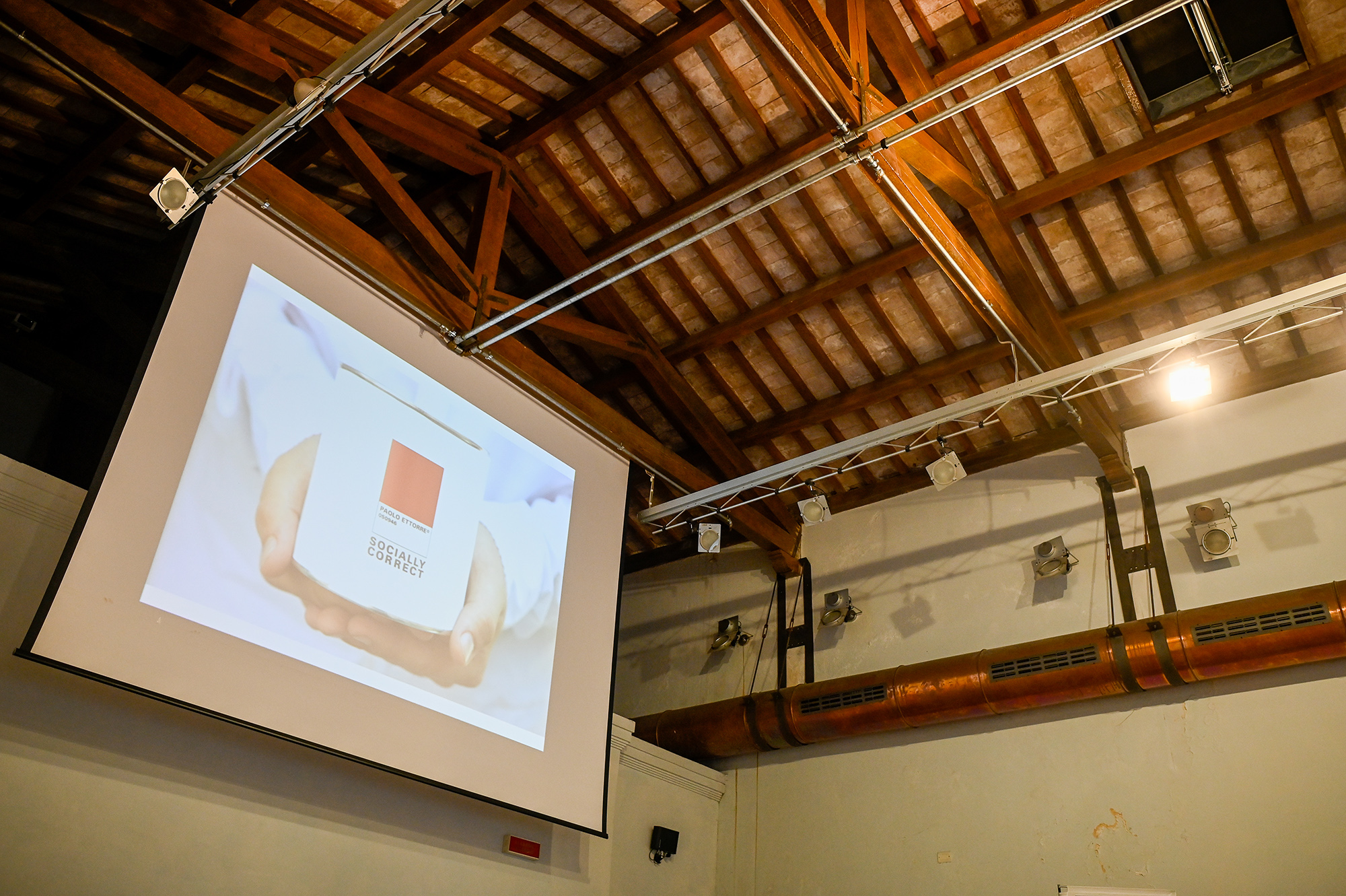 Festival di Spoleto event with projection of Socially Correct book cover