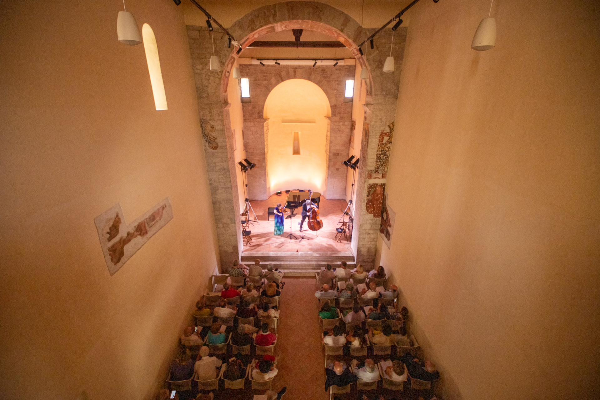 Musical performance at Festival di Spoleto in historic stone-arched venue