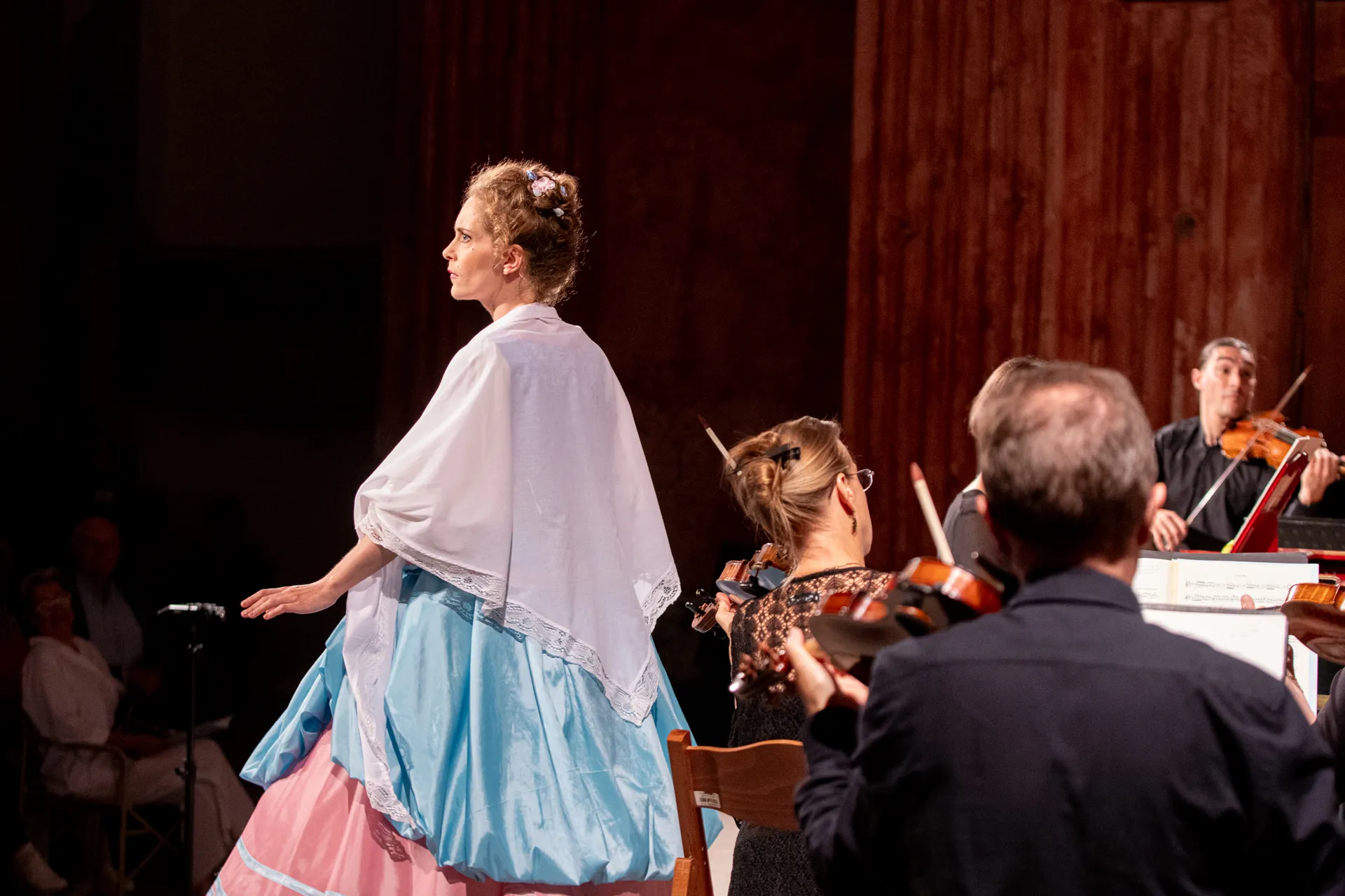 Festival di Spoleto performance with orchestra and performer in blue dress