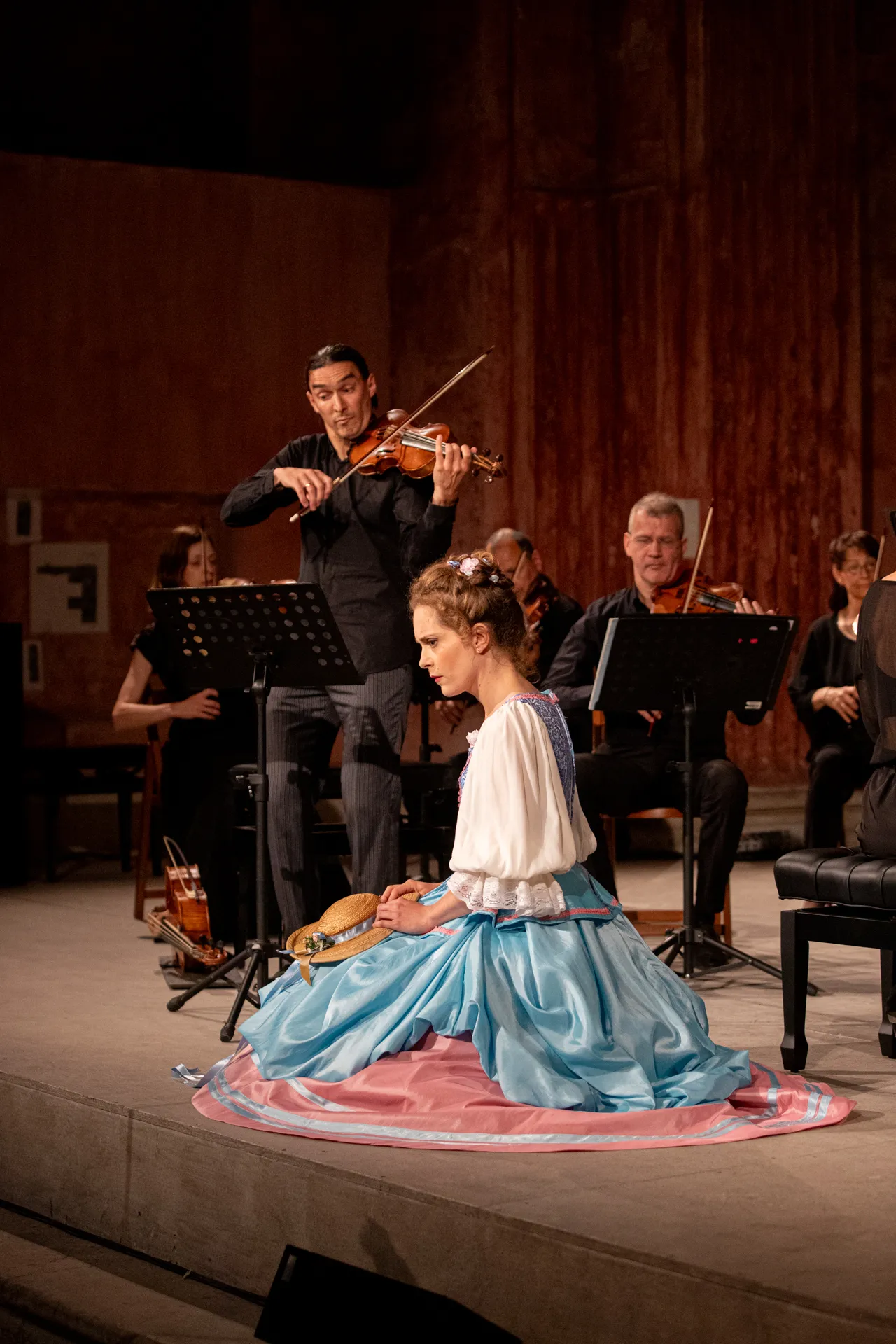 Festival di Spoleto classical performance with violinist and woman in blue dress