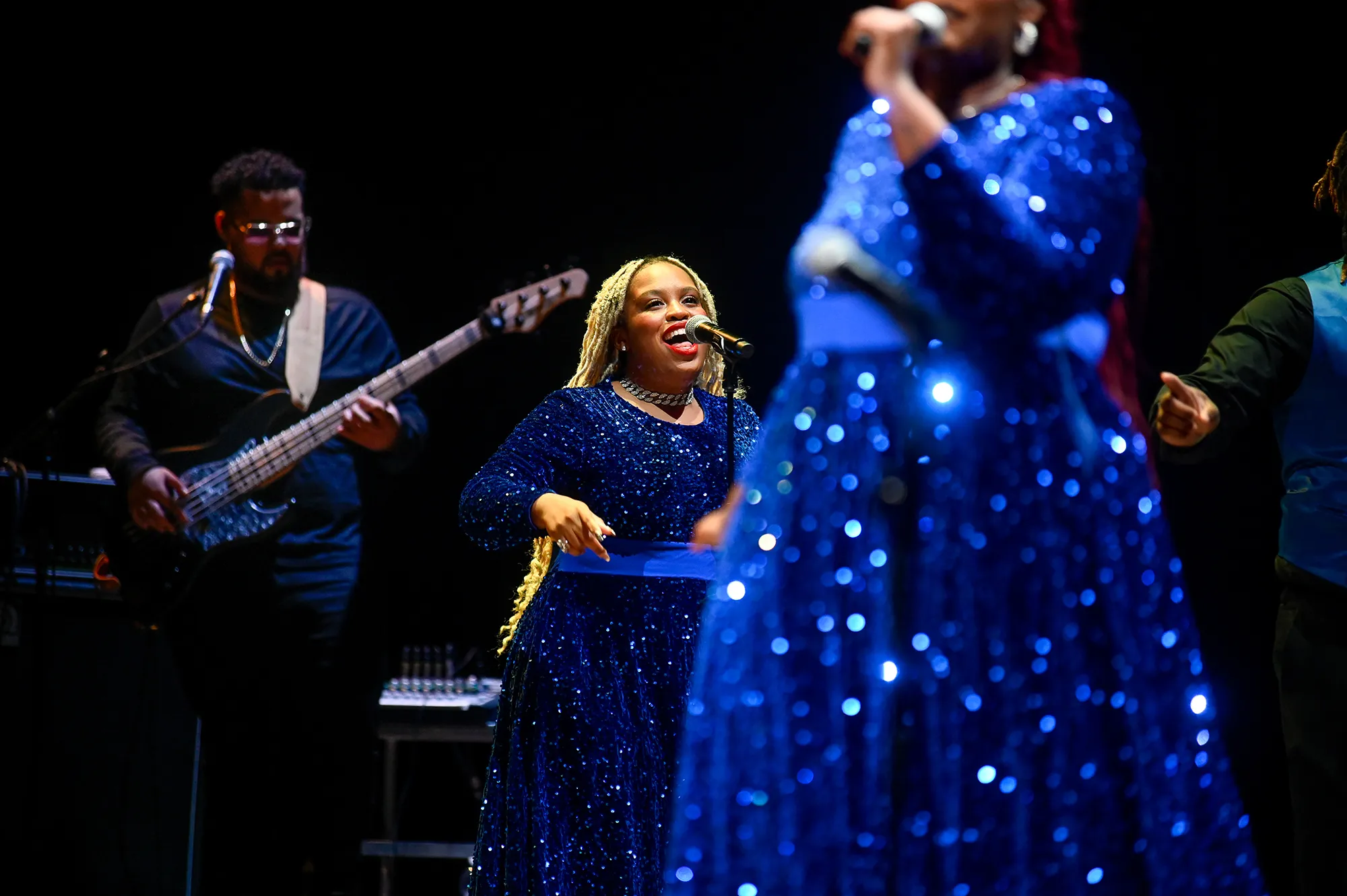Vibrant musical performance at Festival di Spoleto with sparkling blue costumes