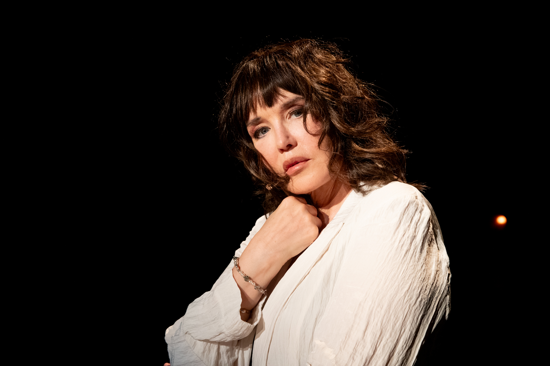 Performer in white shirt at Festival di Spoleto theatrical performance