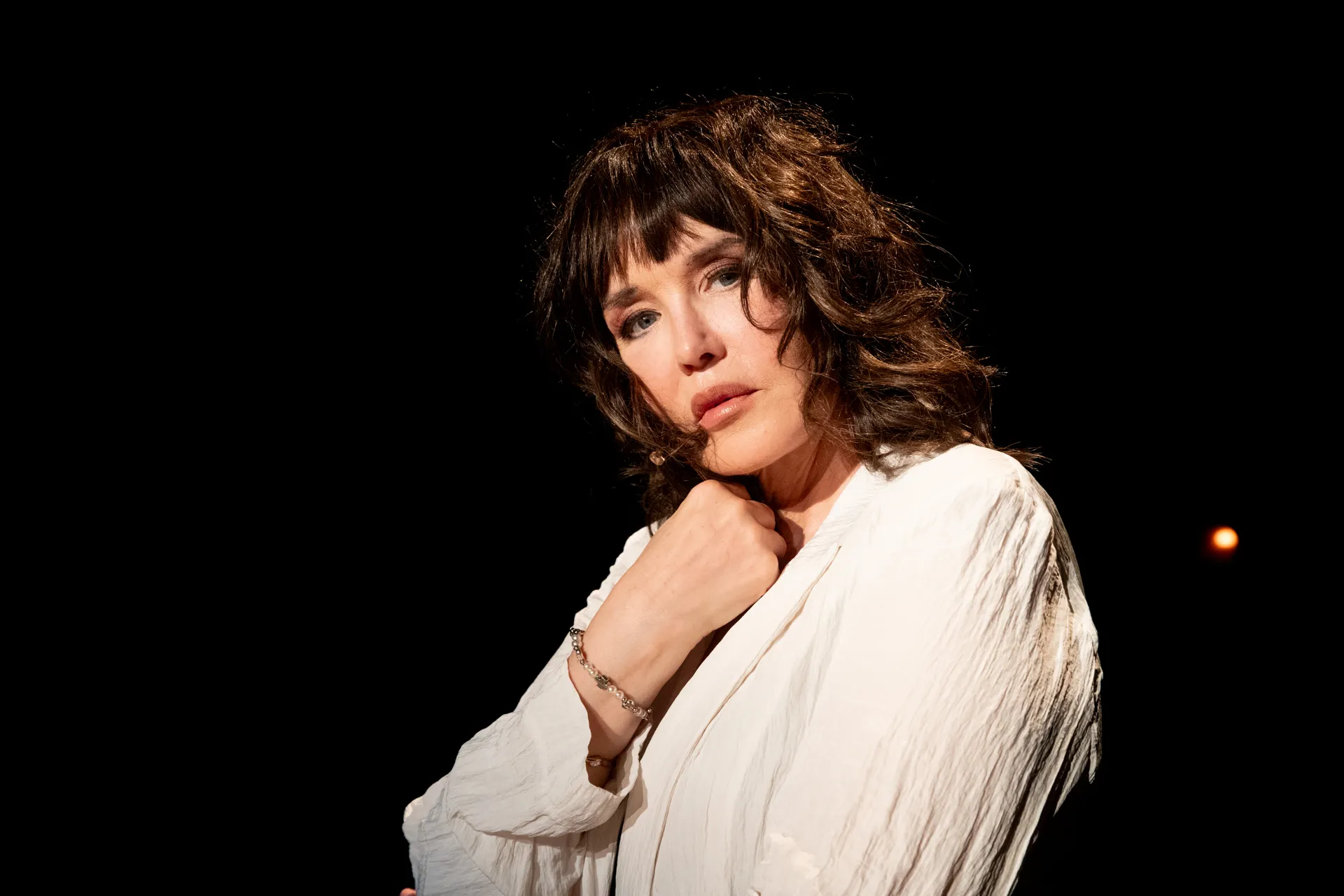 Performer in white shirt at Festival di Spoleto theatrical performance