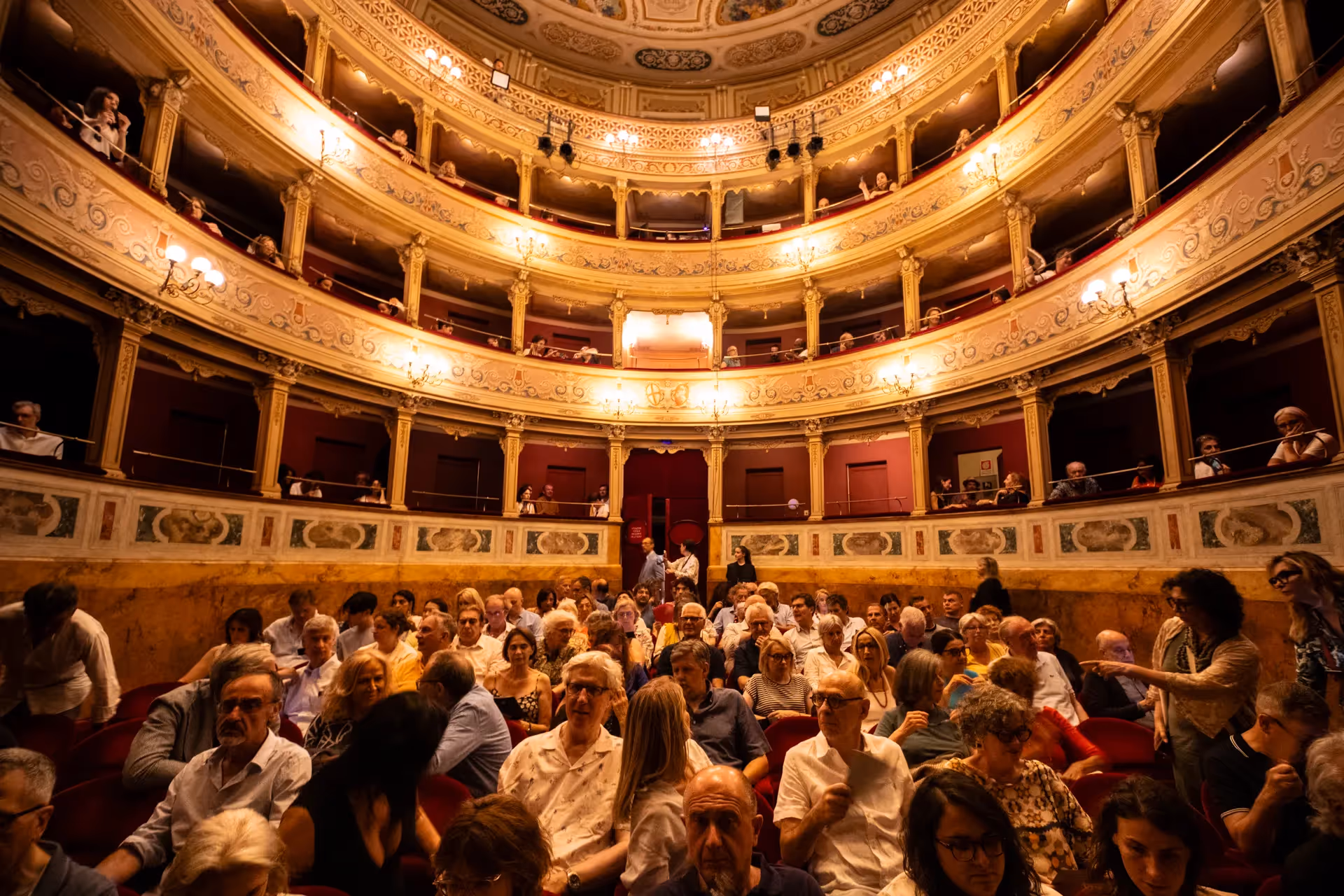 Festival di Spoleto audience fills historic theater with warm golden light