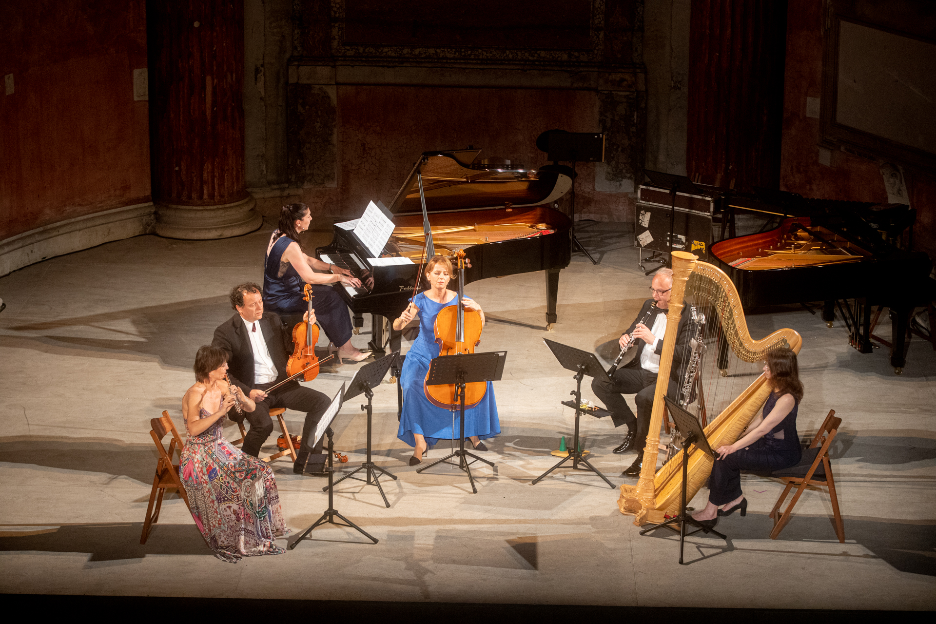 Musical ensemble performing at Festival di Spoleto with diverse classical instruments