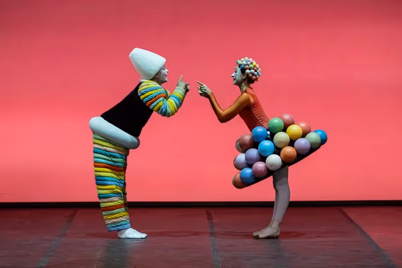 Colorful performers interact at Festival di Spoleto with whimsical costume design