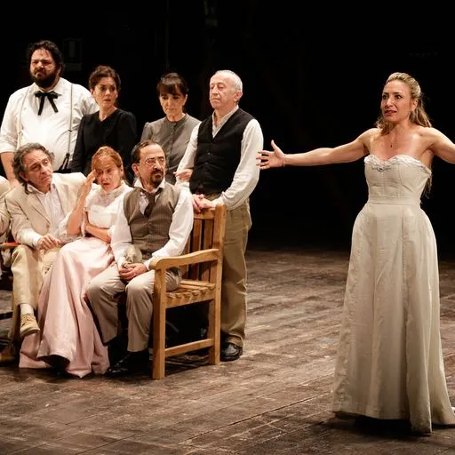 Festival di Spoleto theater performance with diverse actors in elegant stage costumes