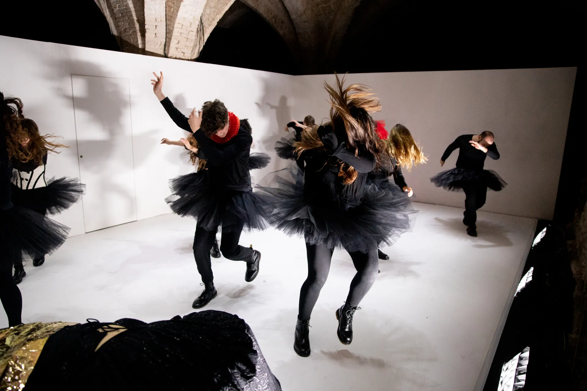 Energetic dancers in black tutus performing at Festival di Spoleto