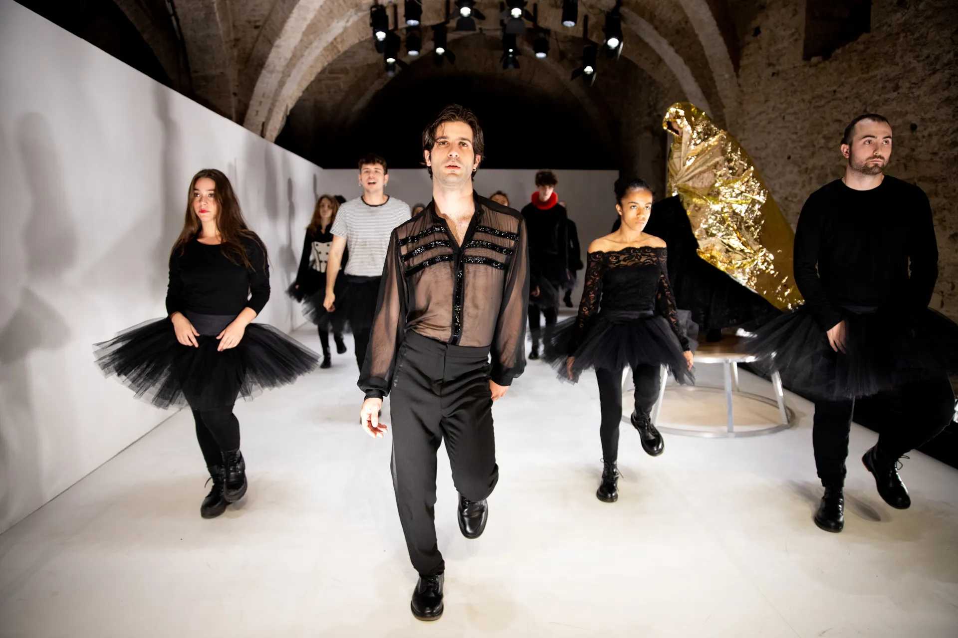 Festival di Spoleto fashion show with models in black tutus and dramatic staging