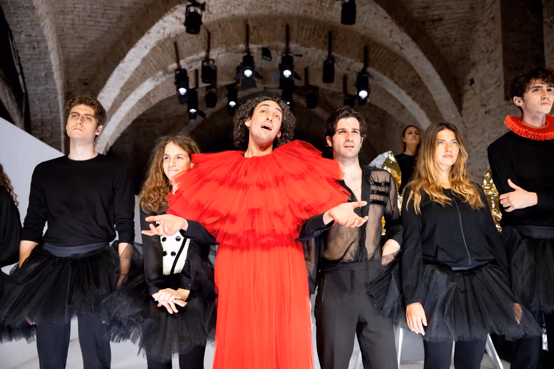 Performers in dramatic costumes at Festival di Spoleto theatrical production