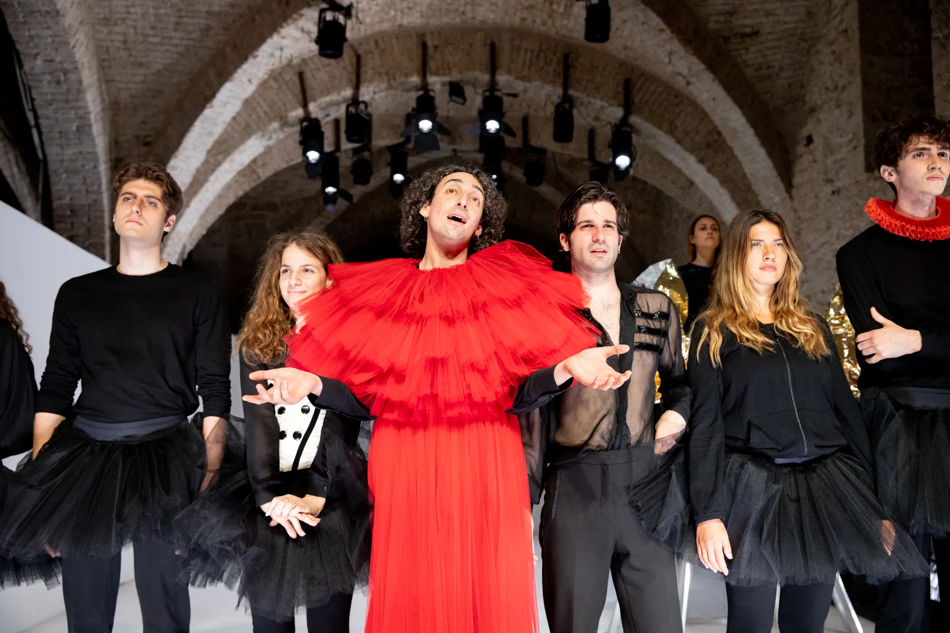 Performers in dramatic costumes at Festival di Spoleto theatrical production