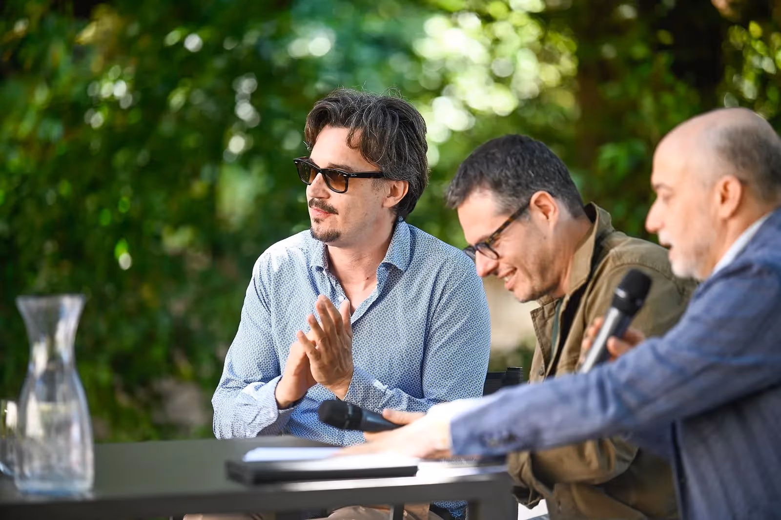 Festival di Spoleto panel discussion with three professionals outdoors
