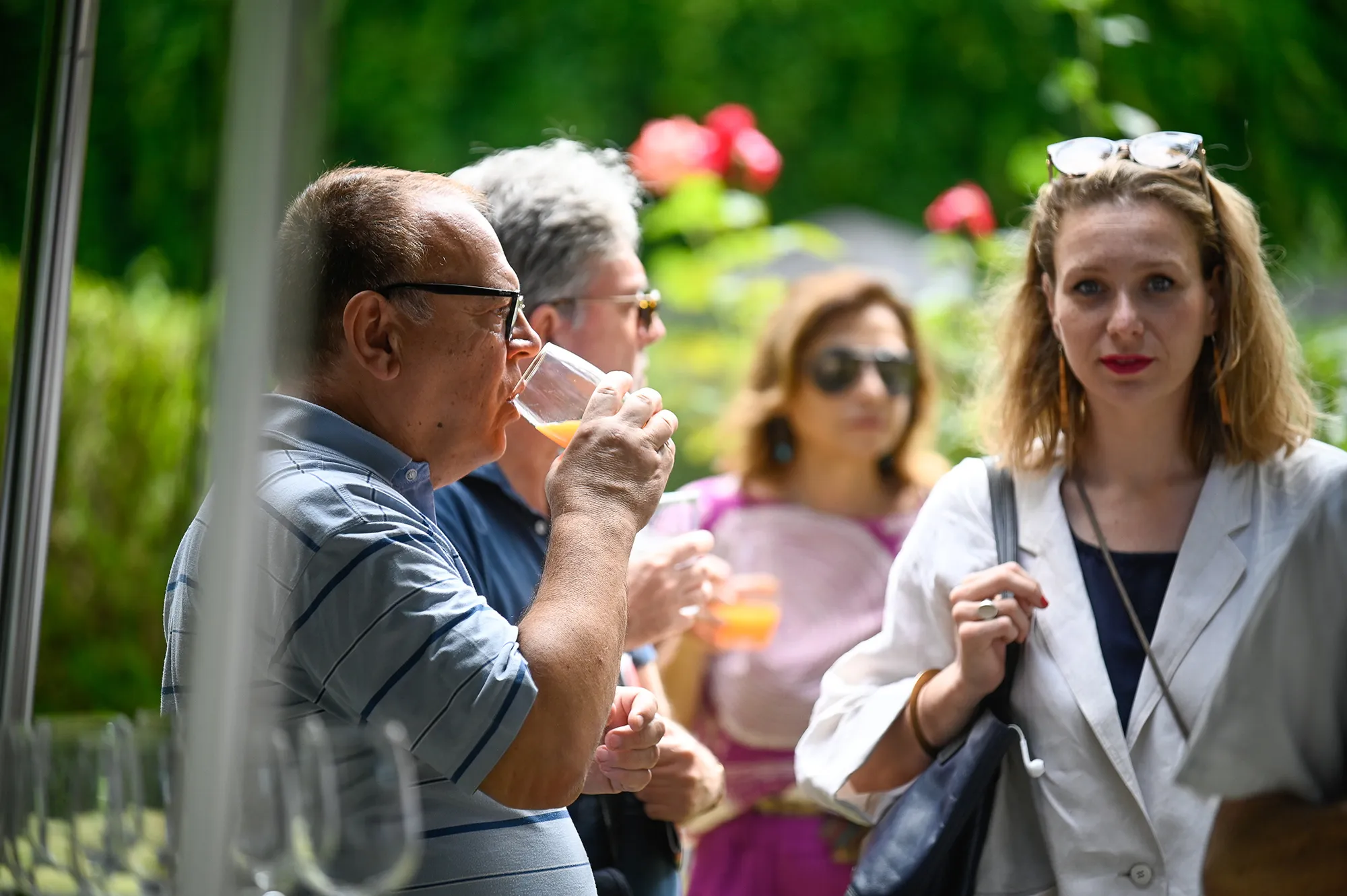 Festival di Spoleto attendees enjoying drinks and conversation outdoors