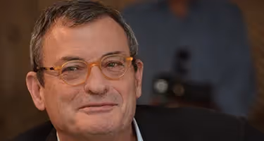Artistic portrait of a smiling man at Festival di Spoleto cultural event
