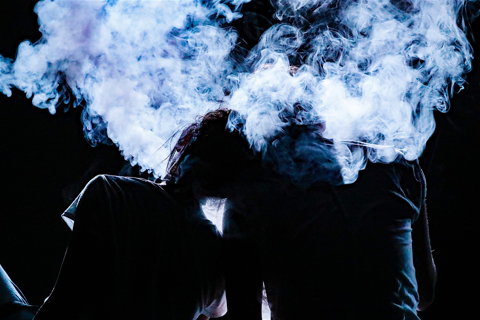 Festival di Spoleto performance with dramatic smoke obscuring performer