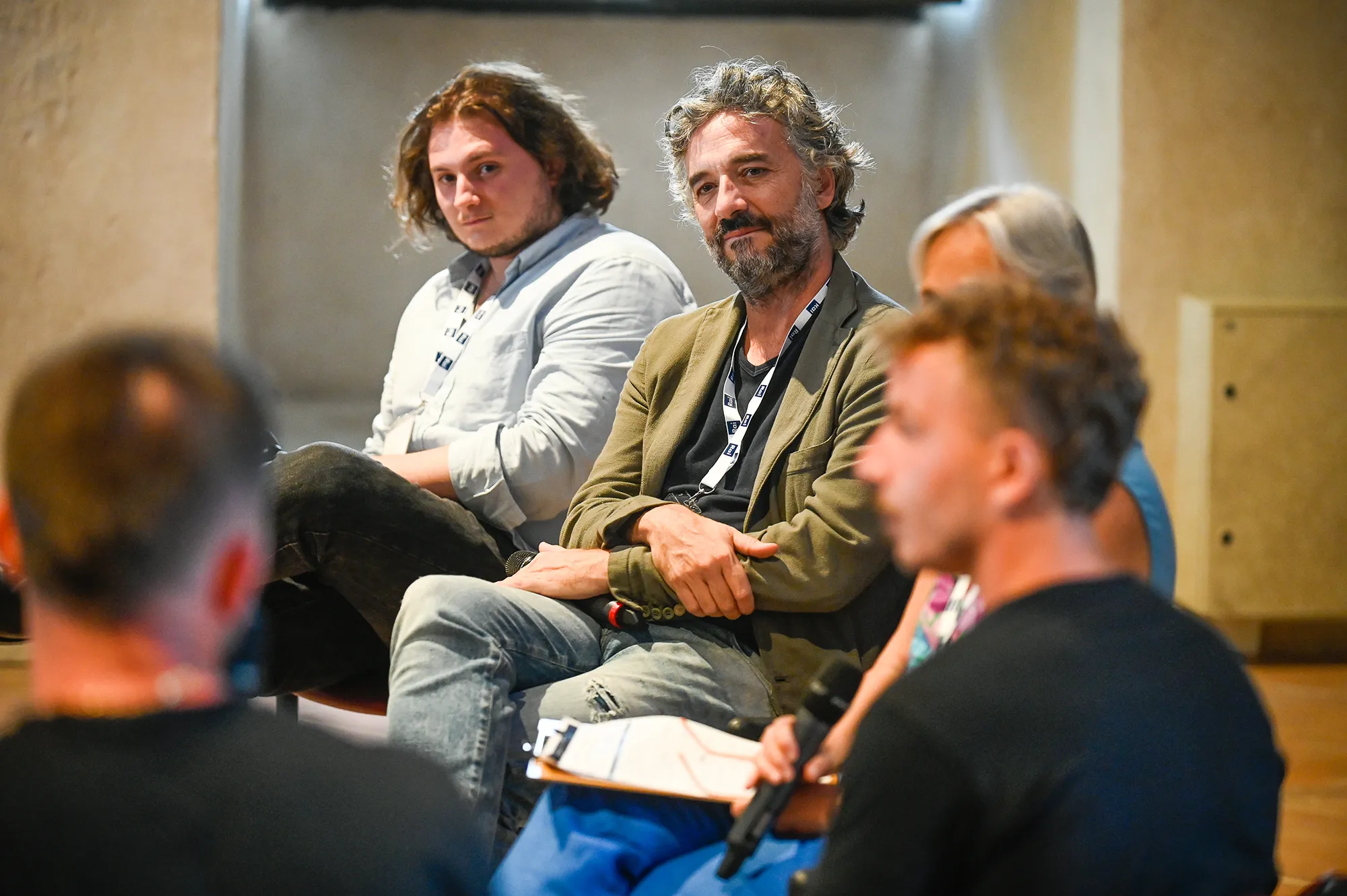 Festival di Spoleto panel discussion with speakers seated in attentive conversation