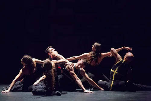 Dancers performing dynamic contemporary choreography at Festival di Spoleto