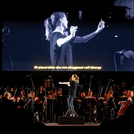 Performer on stage at Festival di Spoleto, conducting orchestra with passion