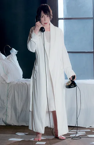 Woman in white calling at Festival di Spoleto performance art scene