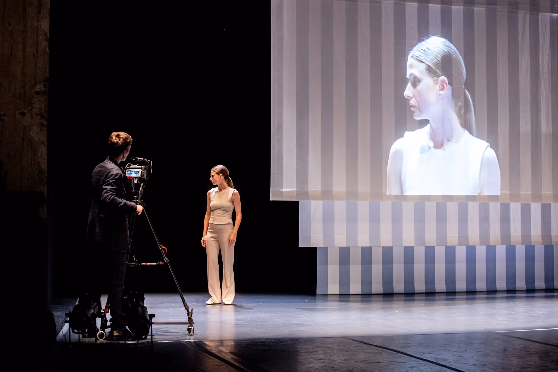 Performance art at Festival di Spoleto featuring live performer and video projection