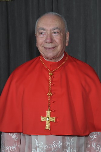 Cardinal at Festival di Spoleto wearing bright red traditional ecclesiastical vestments