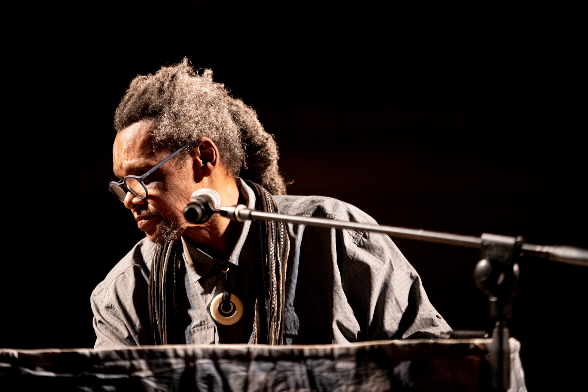 Musician performing at Festival di Spoleto with intense musical expression