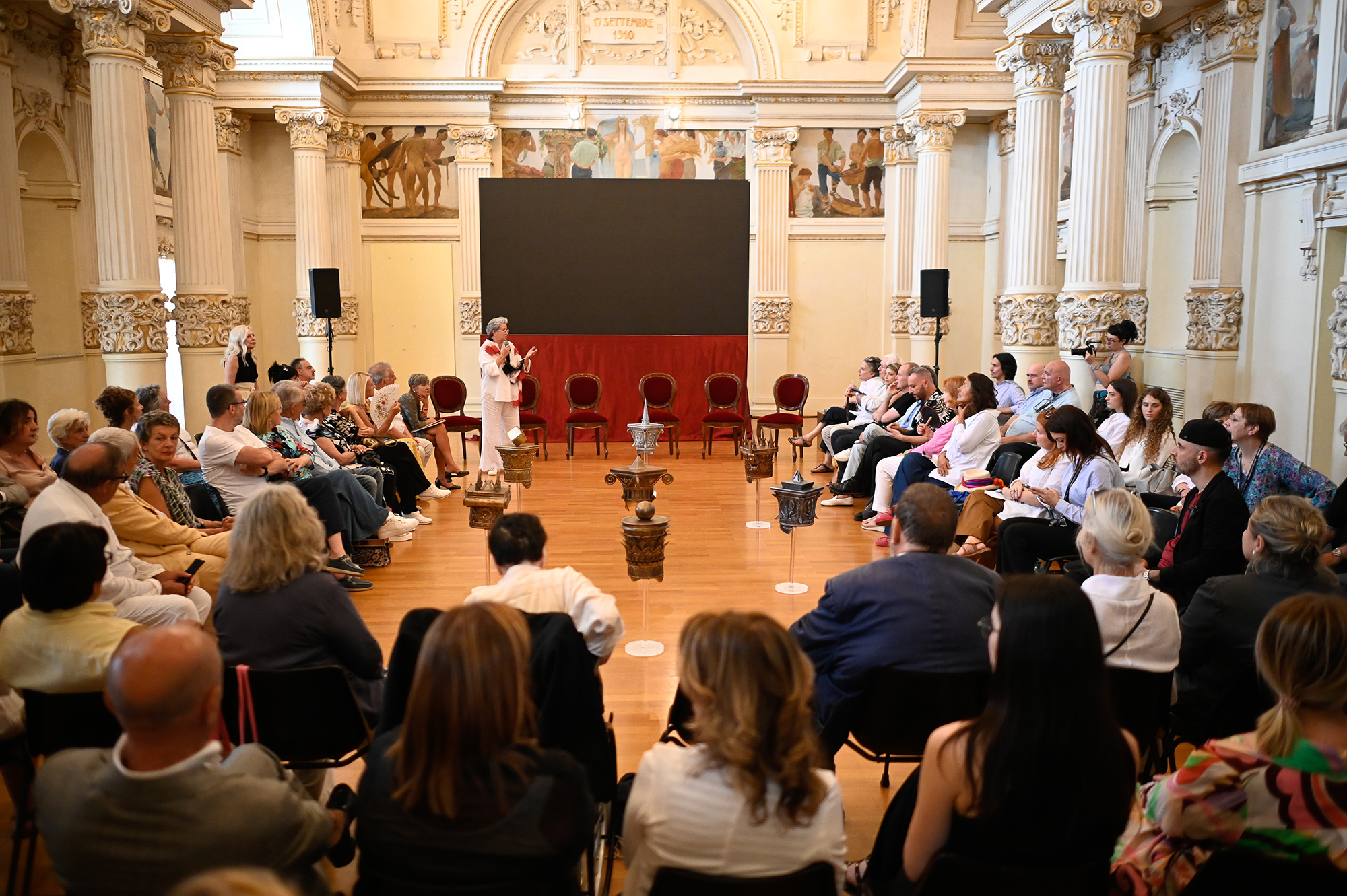 Elegant venue during Festival di Spoleto with audience and speaker