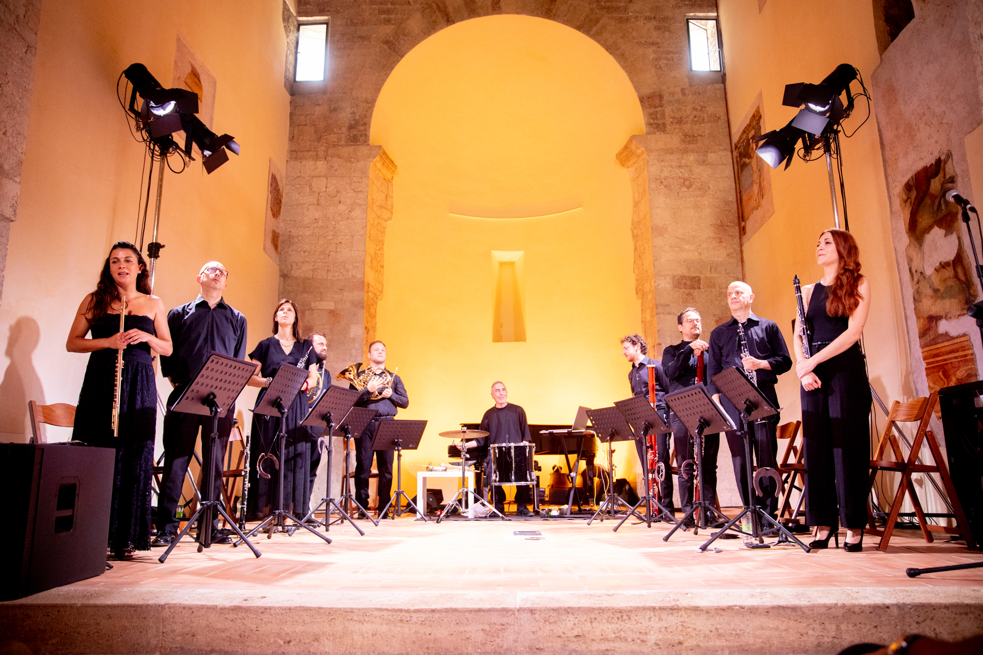 Musical ensemble performing at Festival di Spoleto in historic stone venue