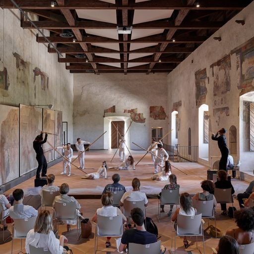 Festival di Spoleto performance with dancers and audience in historic architectural space