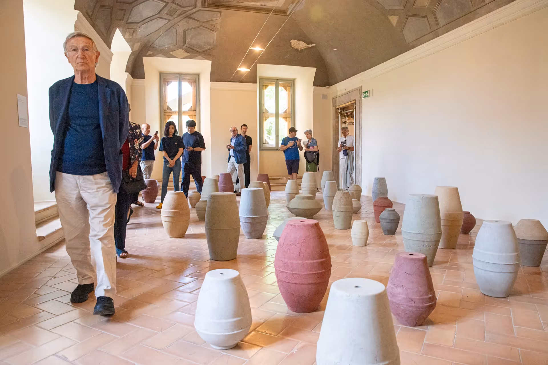 Festival di Spoleto ceramic art exhibition with colorful vases and visitors