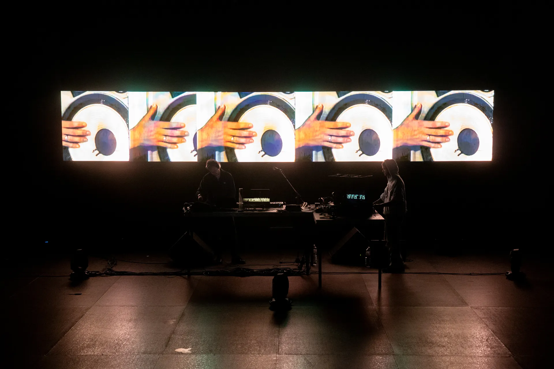 Festival di Spoleto multimedia performance with projected hands and digital screens