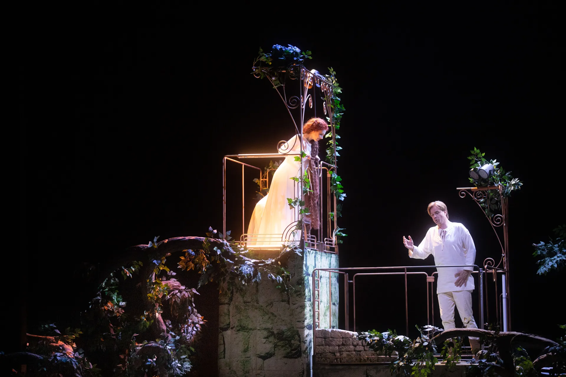 Festival di Spoleto theatrical performance with dramatic stage lighting and actors