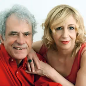Festival di Spoleto performers posing together in red clothing