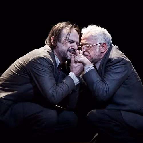 Two men in intense theatrical moment at Festival di Spoleto performance