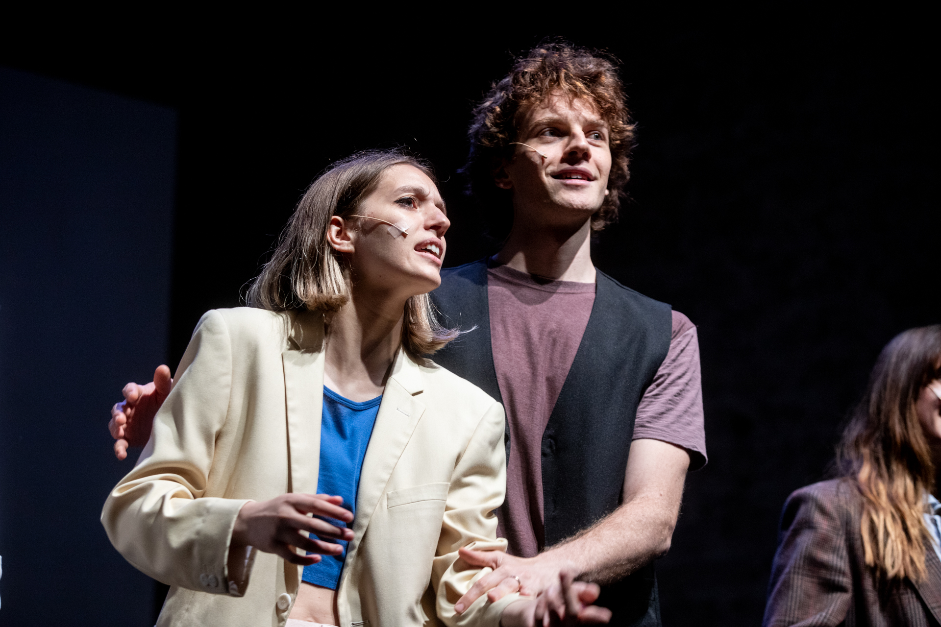 Performers at Festival di Spoleto showcasing emotional theatrical performance on stage