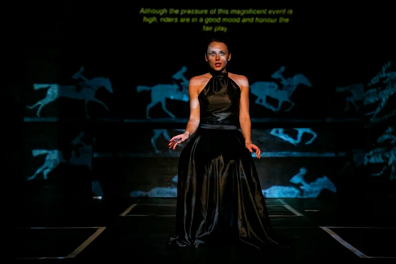 Dramatic performance at Festival di Spoleto with performer in black elegant gown