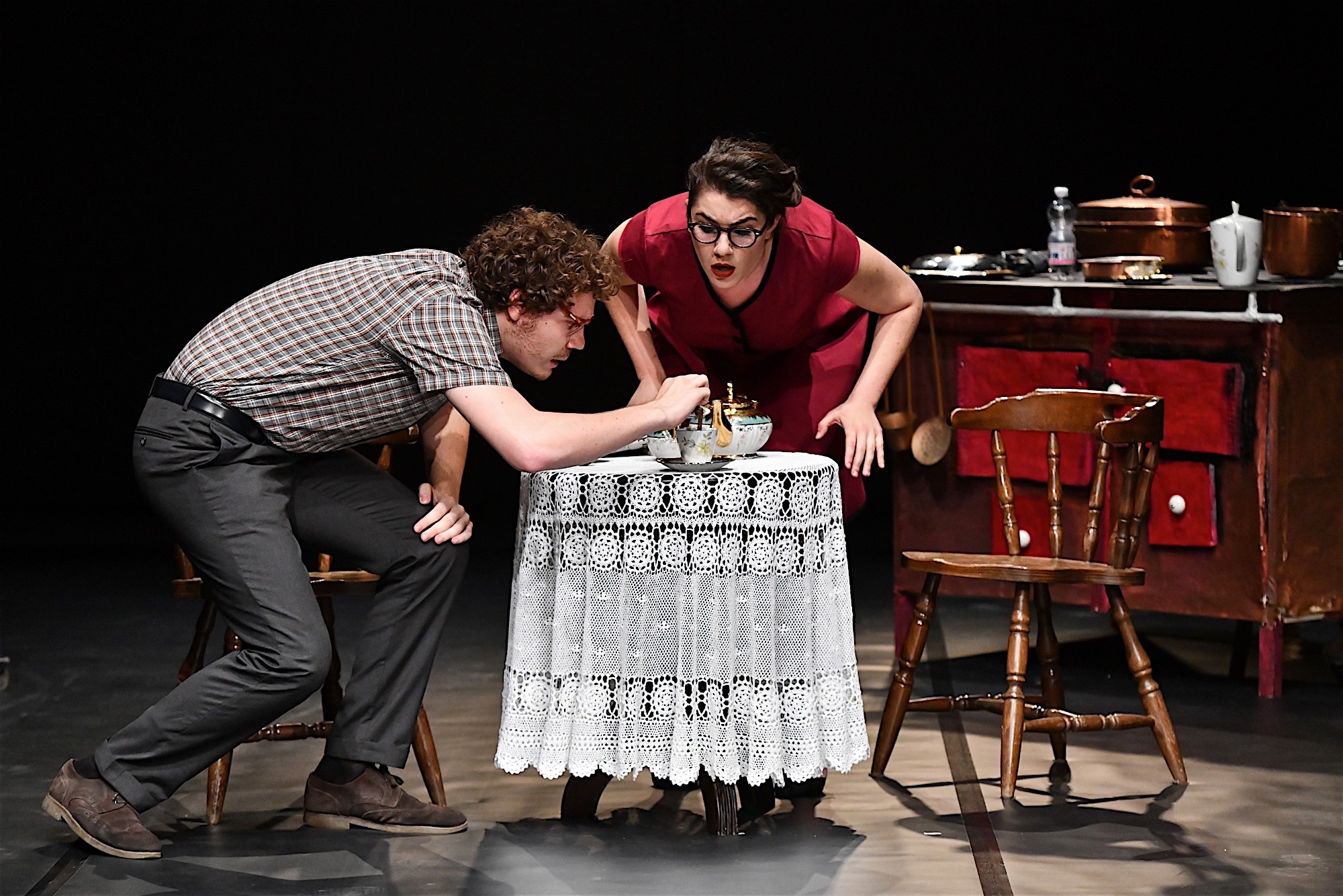 Festival di Spoleto theatrical performance with actors in intense kitchen scene