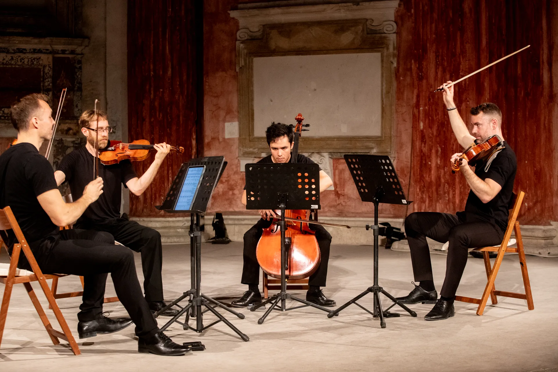 String quartet performing at Festival di Spoleto in historic ornate venue