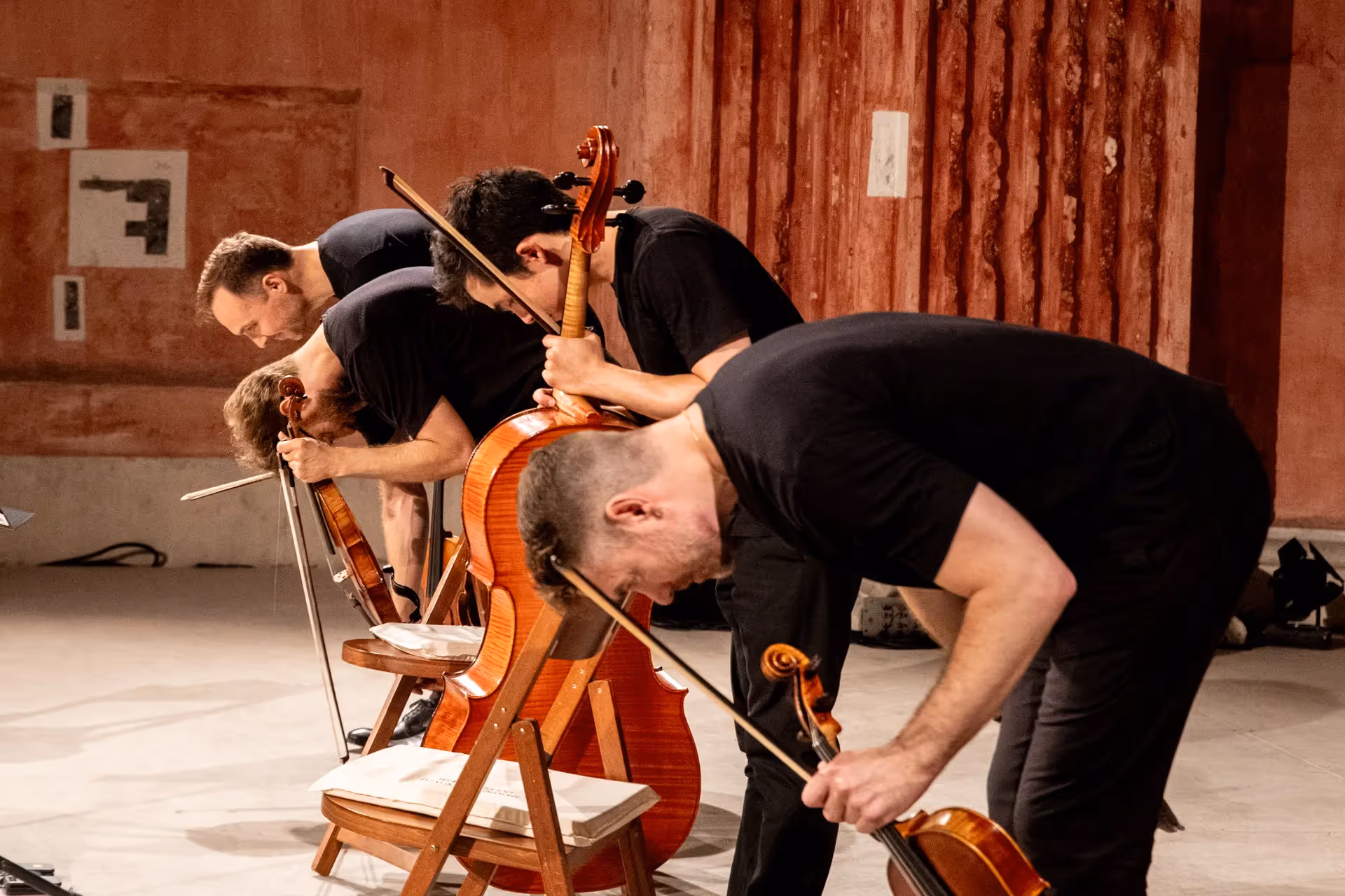 Musicians performing intense string quartet at Festival di Spoleto
