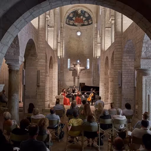 Festival di Spoleto musicians perform classical concert in historic stone church