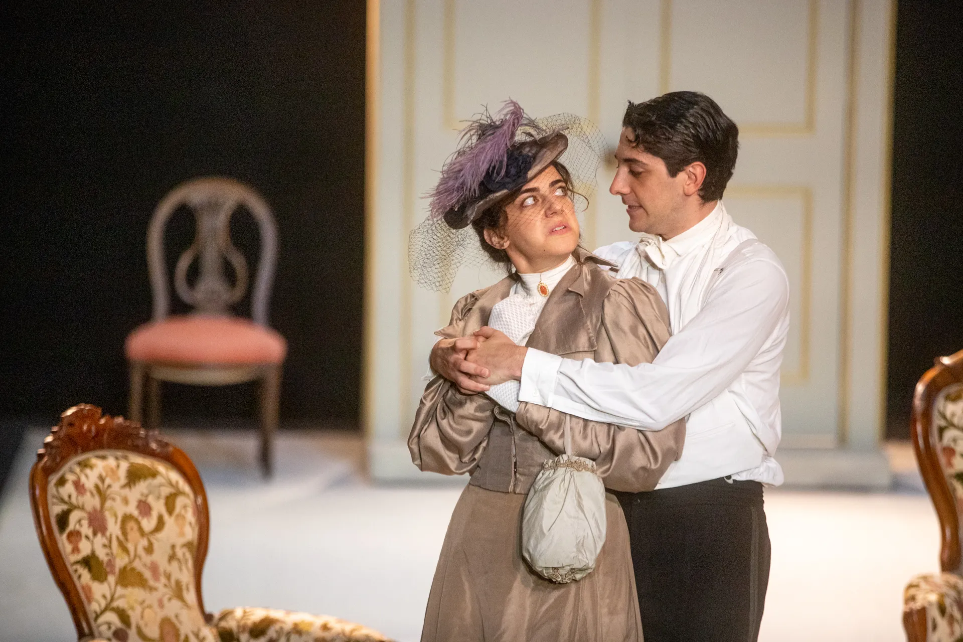 Festival di Spoleto theatrical performance with period-dressed actors embracing