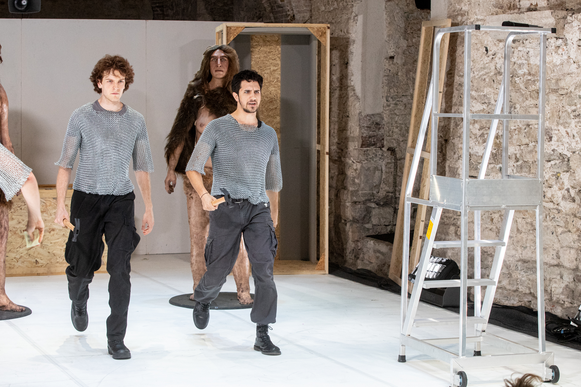Festival di Spoleto performance with performers in chainmail-like shirts