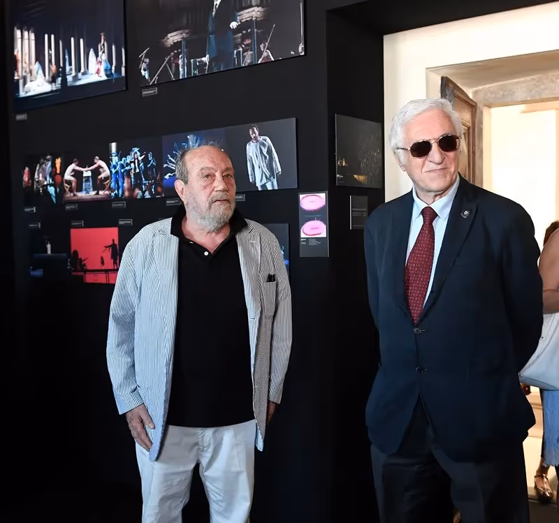 Two distinguished gentlemen at Festival di Spoleto exhibition showcasing artistic performances