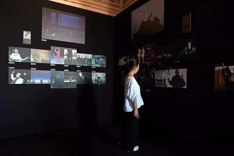 Festival di Spoleto exhibition showcasing multimedia art installation with projected images