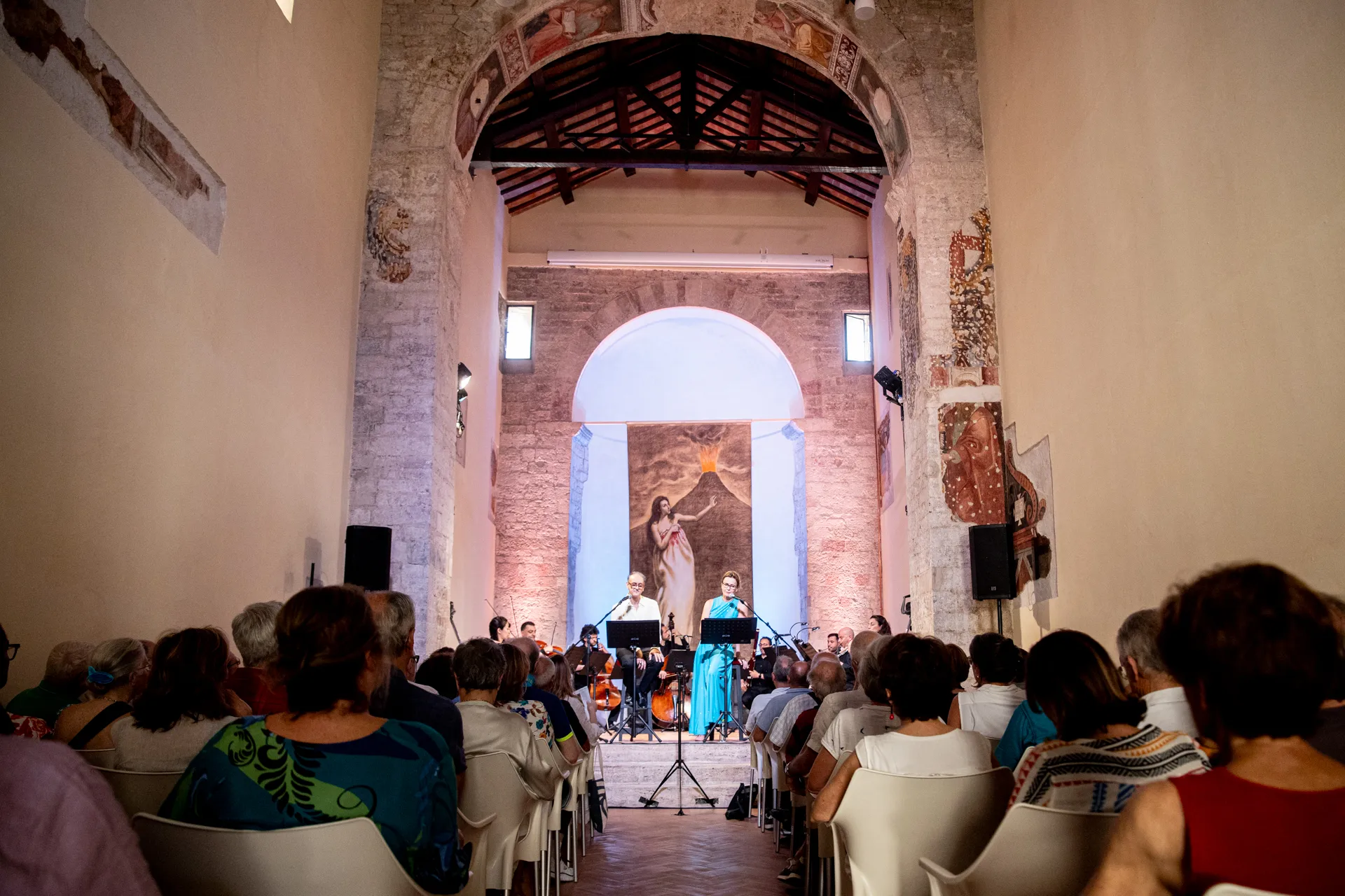 Festival di Spoleto concert in historic stone venue with musicians performing