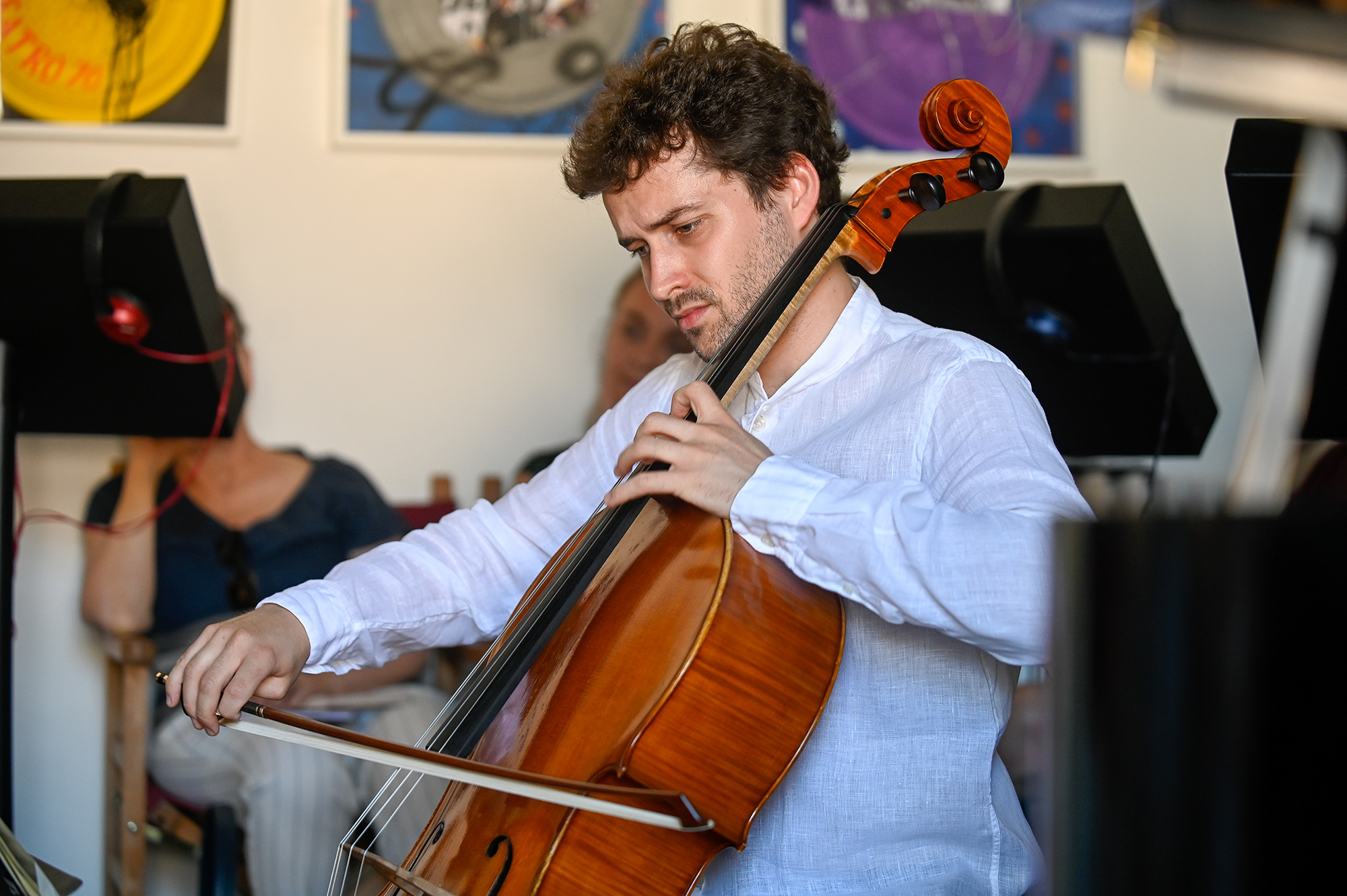 Cellist performing at Festival di Spoleto, immersed in passionate musical expression
