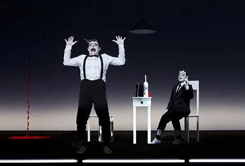 Dramatic mime performance at Festival di Spoleto, black and white theatrical scene