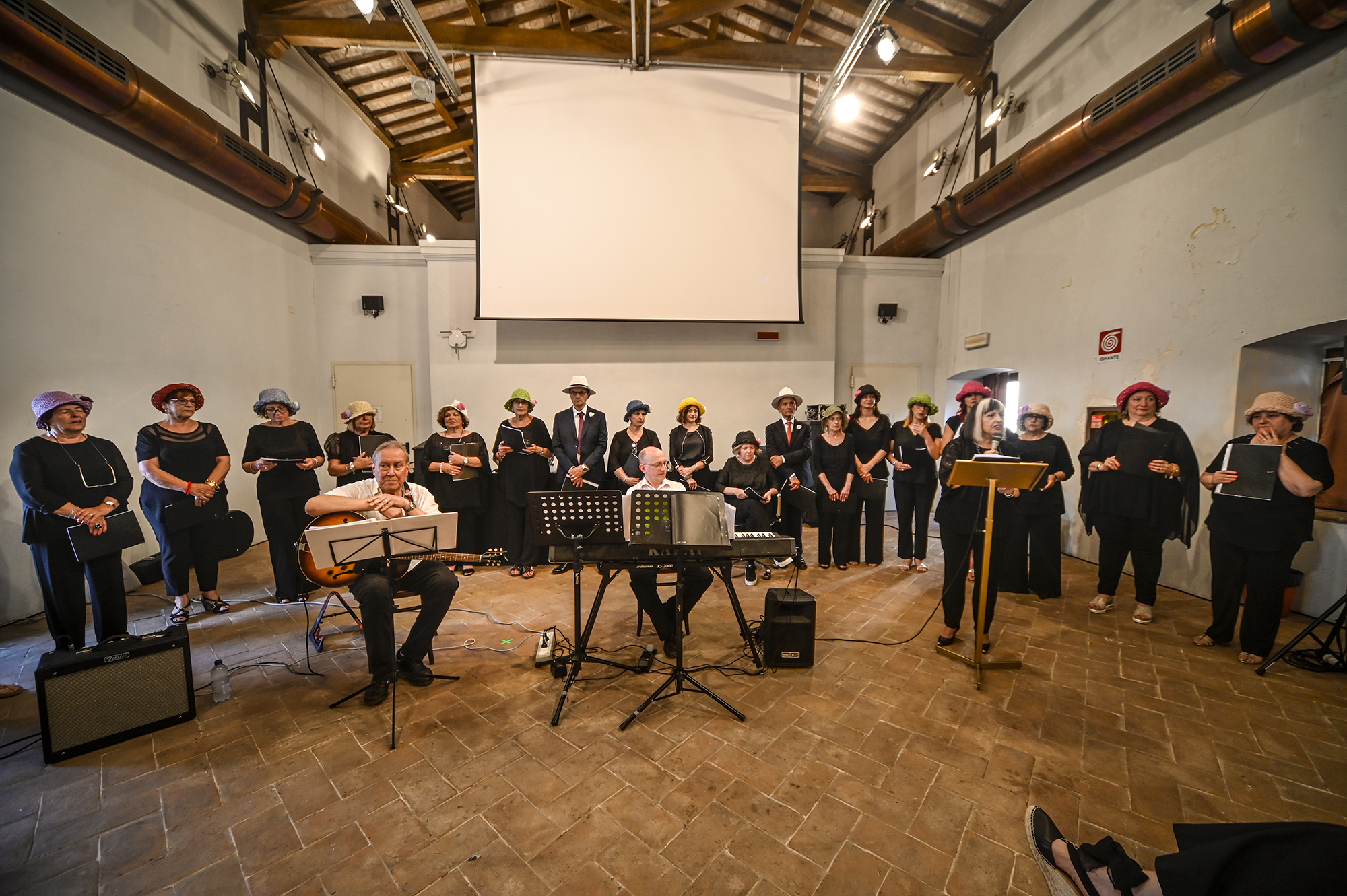 Festival di Spoleto musical performance with choir and musicians in black attire